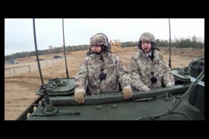Latvian Prime Minister and Chairman of Defense Ride with Soldiers