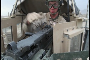 Engineers with 1st Combat Engineer Battalion, 1st Marine Division (Forward), function check their weapons
