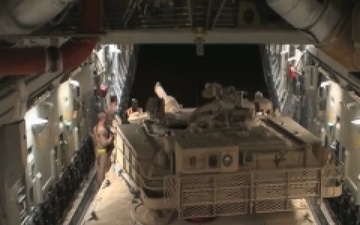 Time Lapsed Footage of Airmen Unloading Abrams Tank onto C-17 Globemaster III