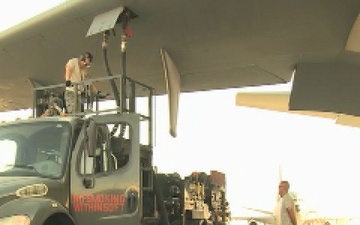 Airmen Empty Fuel Tanks of a KC-10 Extender