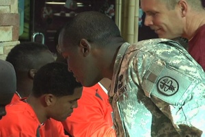 Miami Hurricanes Sign Autographs For Fort Bliss Fans