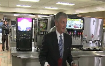 Secretary of the Army the Honorable John McHugh eats lunch at the 787th MP BN Dining Facility