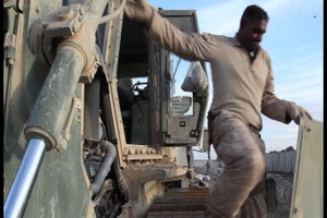 Marines of 1st Combat Engineer Battalion Working on a Bulldozer