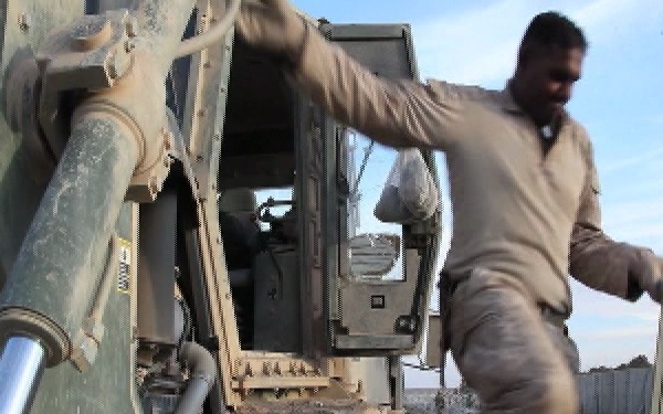 Marines of 1st Combat Engineer Battalion Working on a Bulldozer
