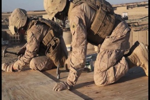 Garmser - Marines with 1st Combat Engineer Battalion Build a Wooden Guard Post at a Patrol Base