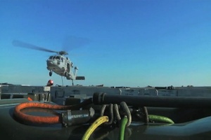 USS Harry S. Truman Performs Ordnance and Munitions Transfer