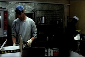 Senior Airman Bryant Davis Prepares Meals for FOB Smart