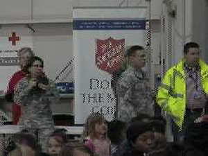 DOD Evacuees from Japan Land at Denver International Airport