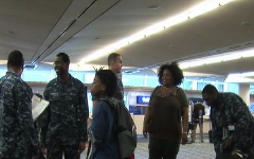 Navy Families Arrive at Jacksonville International Airport From Naval Bases in Japan