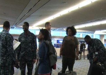 Navy Families Arrive at Jacksonville International Airport From Naval Bases in Japan