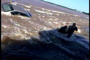 Citizen-Soldiers Rescue Woman in Dramatic Flood Video
