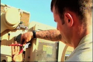 Soldiers Assist Replacements in Truck Armoring - Package, Long