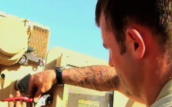 Soldiers Assist Replacements in Truck Armoring - Package, Long