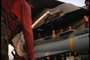 Strike Fighter Squadron 211 Load a Maverick Missile