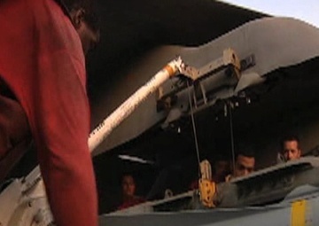 Strike Fighter Squadron 211 Load a Maverick Missile