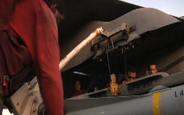 Strike Fighter Squadron 211 Load a Maverick Missile