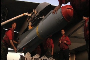 Strike Fighter Squadron 211 Load a Maverick Missile