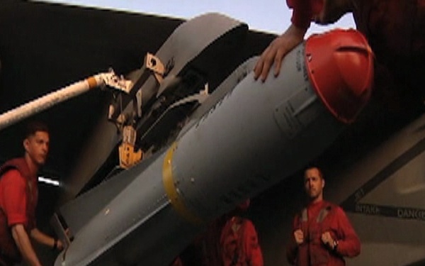 Strike Fighter Squadron 211 Load a Maverick Missile