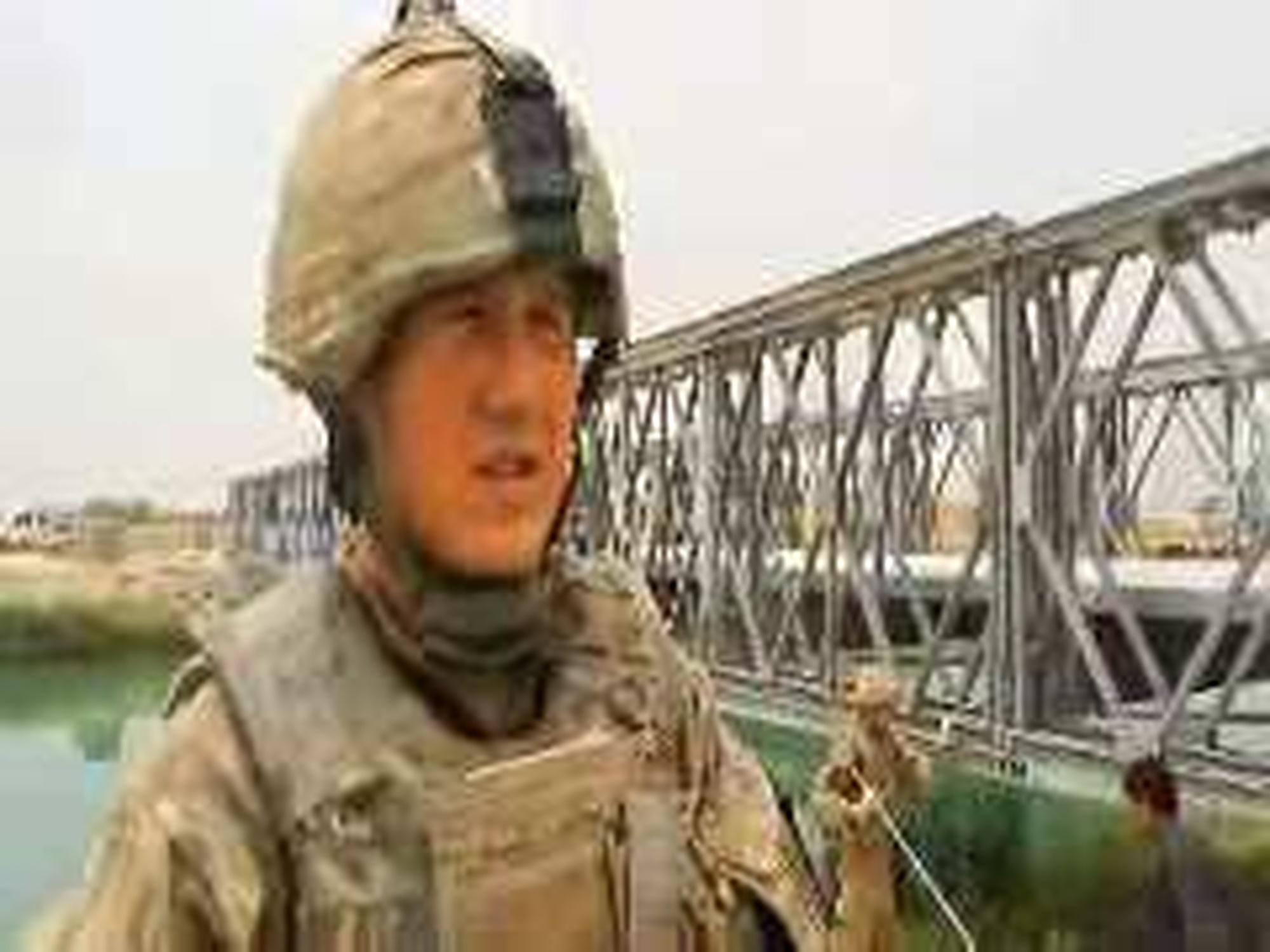 Sapper Anthony Romans, electrician, 39th Armored Engineer Squadron, Milton Keynes, U.K., talks to a military reporter about the construction of a bridge on the Nahr-e-Bughra Canal. Produced by Lance Cpl. Bryan Nygaard. Also available in high definition.