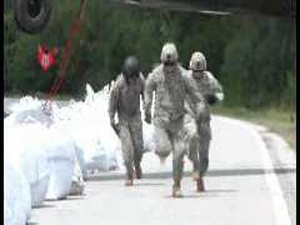 Missouri Guard Blackhawk drops sand bags B-Roll