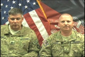 Sgt. 1st Class Reagan Metcalf and Chief Warrant Officer Robert Flynn
