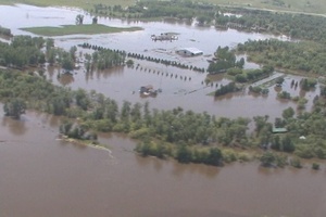 Aerial footage of Souris River in Minot North Dakota June 23