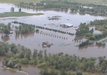 Aerial footage of Souris River in Minot North Dakota June 23