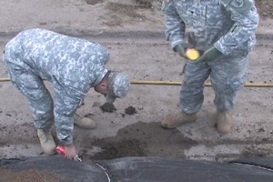 North Dakota National Guard Lay Trap Bags in Minot