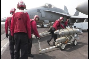 USS George H.W. Bush Aviation Ordnancemen Load Ammo