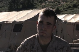 Marine from 3rd Force Reconnaissance Battalion conducts and interview