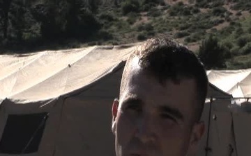 Marine from 3rd Force Reconnaissance Battalion conducts and interview