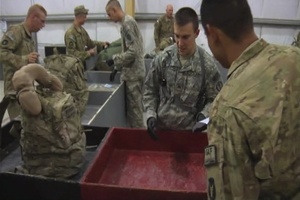 Customs Agents Clear Troops For Return Home