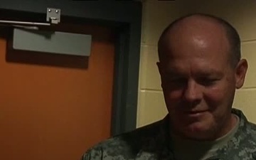 National Guard officer honored with ceremonial first pitch