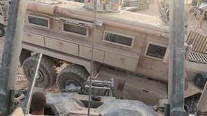 Tank Mechanics Lifting Damaged MRAP