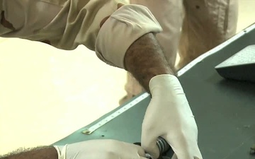 Iraqi Technicians Maintain Aircrew Equipment