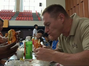 CFAS Sailors Judge Sasebo Burger Contest
