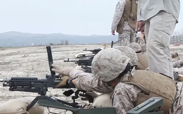 Marines with the female engagement team fire the M240B at Camp Pendleton