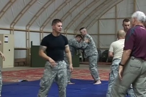 Coach J. Robinson visits Camp Virginia, Kuwait