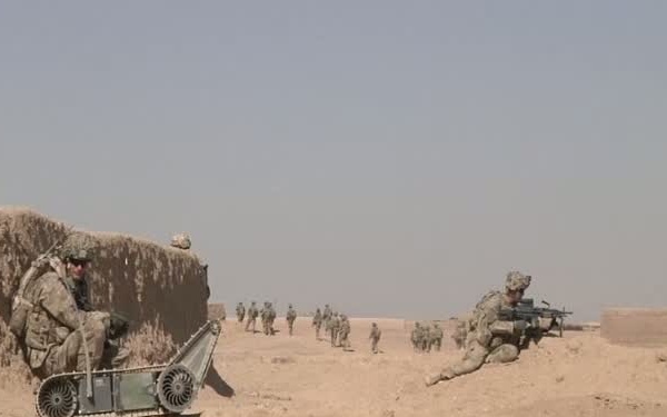 B-Roll Of Sappers Using Throwbot and SUGV Robots