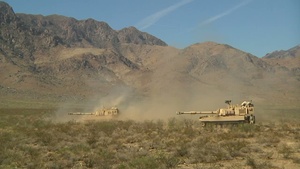 Soldiers and Spouses Fire Artillery Together