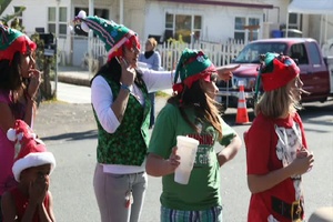 Military policemen take part in Vista Christmas Parade