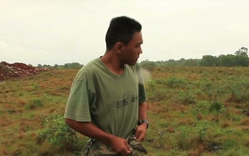 Scout Snipers and Malaysian Army Snipers Conduct a Stalk Exercise