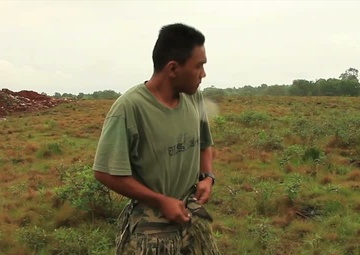 Scout Snipers and Malaysian Army Snipers Conduct a Stalk Exercise