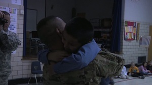 Father home from Afghanistan surprises sons