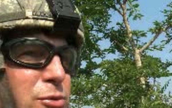 Soldiers Maneuver  Through a Live Fire Exercise Lane