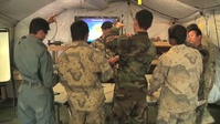 Category K - Afghan instructor teaches explosives