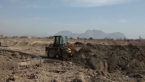 Bucket Loader Fills Hescos