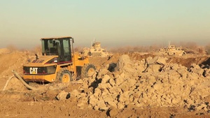 Bucket Loader Fills Hescos