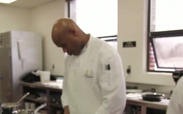 Army Chef Staff Sgt. Billy Daugette heats up the Culinary Arts Competition