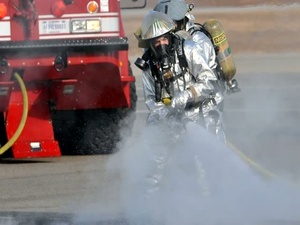 Spotlight Korea: Airmen at Osan Air Base Handle a Simulated Emergency During an Exercise.